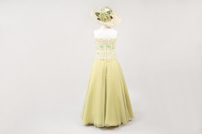 Green gown with matching stole and hat, made by Howard Blair, 1970s Museum of History & Industry Green gown with matching stole and hat, made by Howard Blair, 1970s Museum of History & Industry