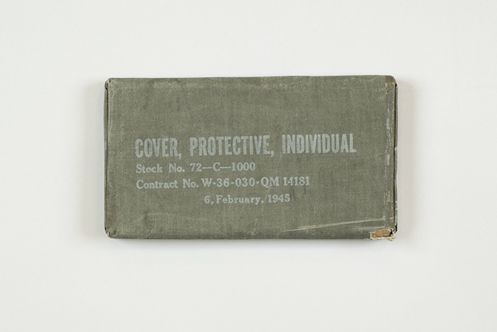 Image of Pack containing treated plastic cover for protection against chemical gas attack, 1945