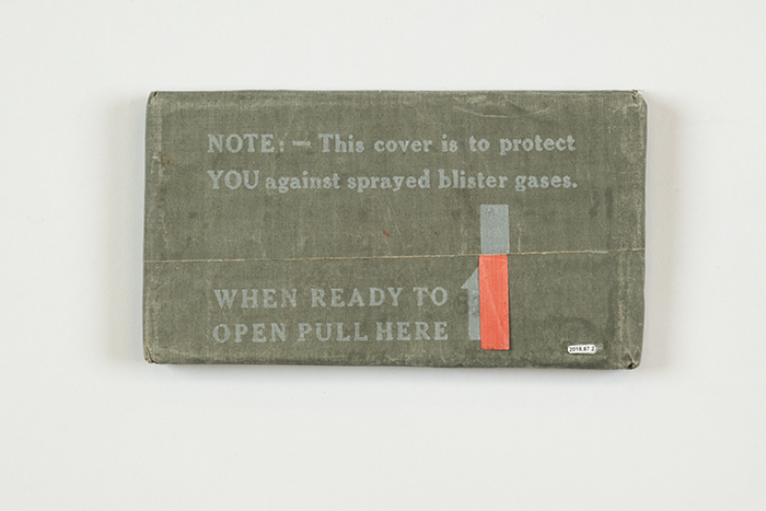 Image of Pack containing treated plastic cover for protection against chemical gas attack, 1945
