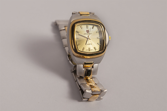 Image of Gold and silver colored wristwatch, ca. 1980s-2010s