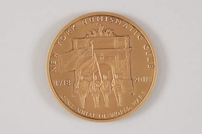 Image of Bronze commemorative coin honoring the 100th anniversary of the end of WWI, minted in 2018