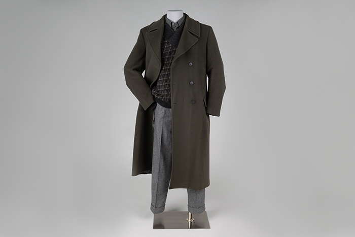 Image of Georgio Armani trenchcoat, sweater, shirt, and trousers from Butch Blum