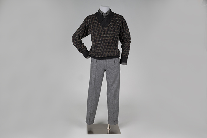 Image of Georgio Armani trenchcoat, sweater, shirt, and trousers from Butch Blum