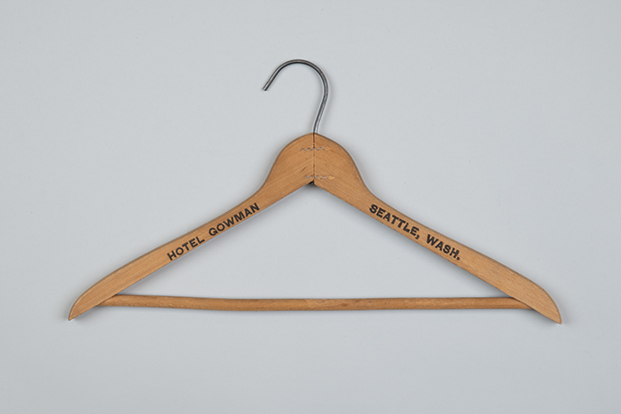 Image of Wooden clothes hanger from the Hotel Gowman in Seattle, ca. 1930