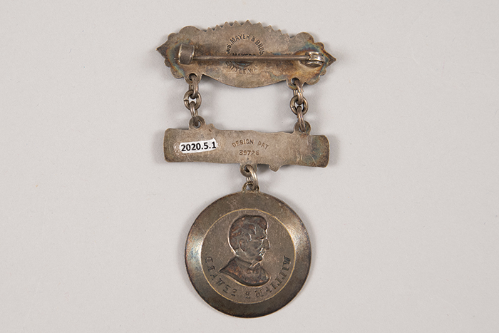 Image of Alaska-Yukon-Pacific Exposition (AYPE) souvenir pin featuring William H. Seward, Seattle, 1909