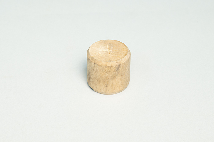 Image of Wooden bullet from the World Trade Organization (WTO) protests, 1999