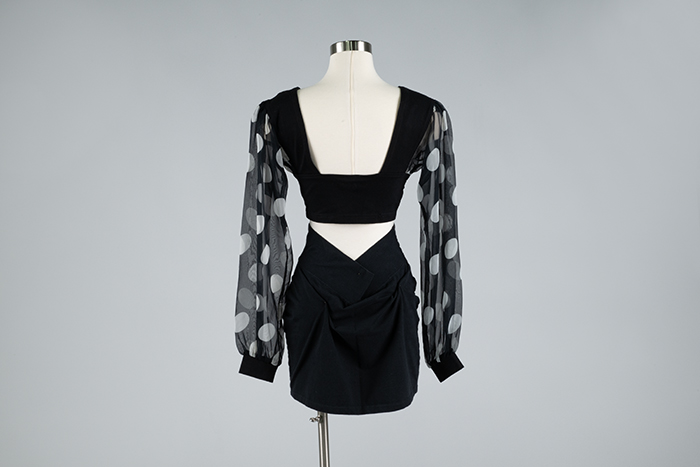 Image of Polka-dot top and black skirt, 