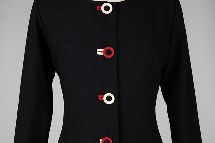 Image of Navy wool dress with red and white accents, 1991