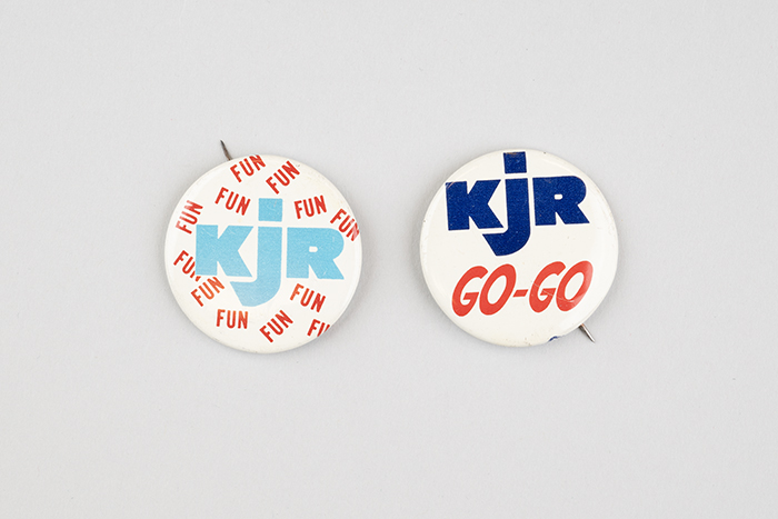 Image of Two KJR radio station pins, ca. 1970