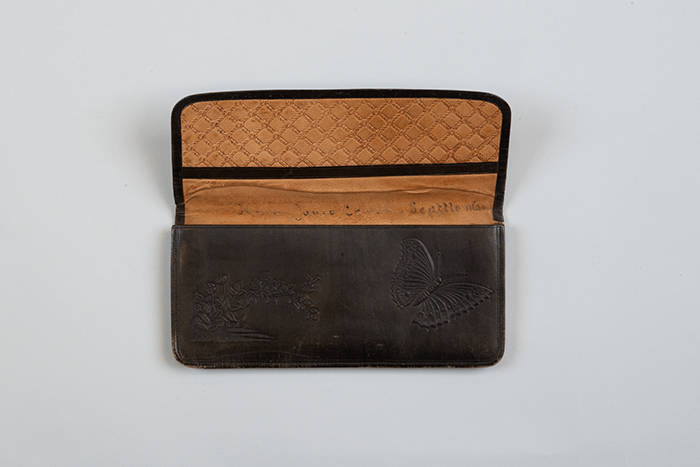 Image of Wallet and coins that once belonged to Morgan James Carkeek, ca. 1866