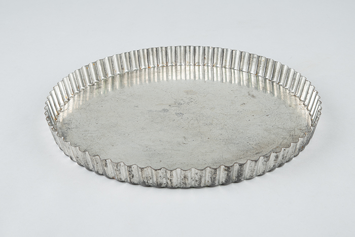 Image of Pie dough pan for torts and flan from Borracchini's Bakery, 1970s
