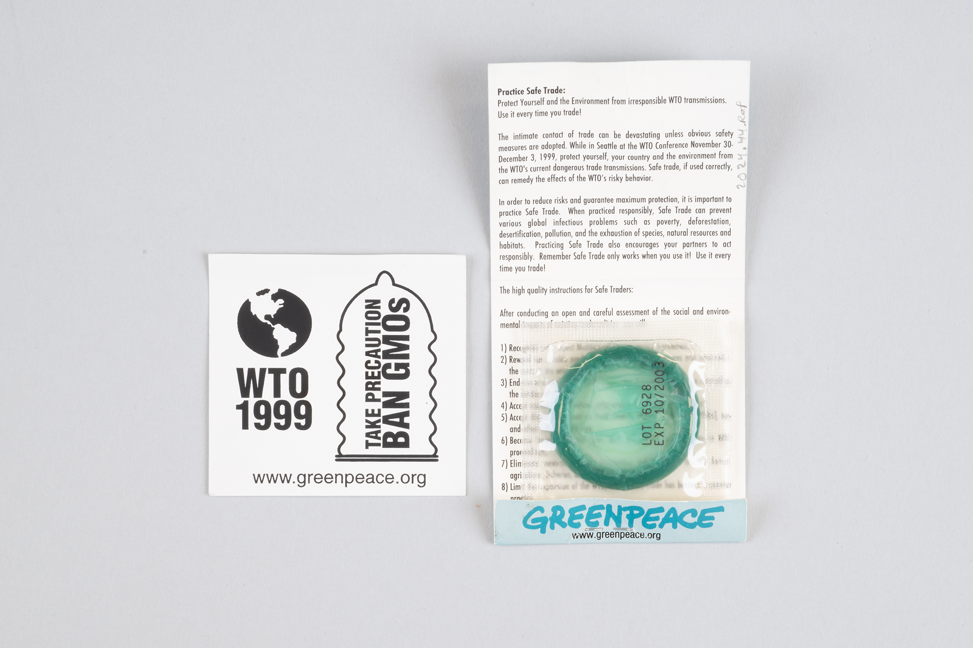Image of Single packaged condom handed out by Greenpeace during WTO protests, 1999