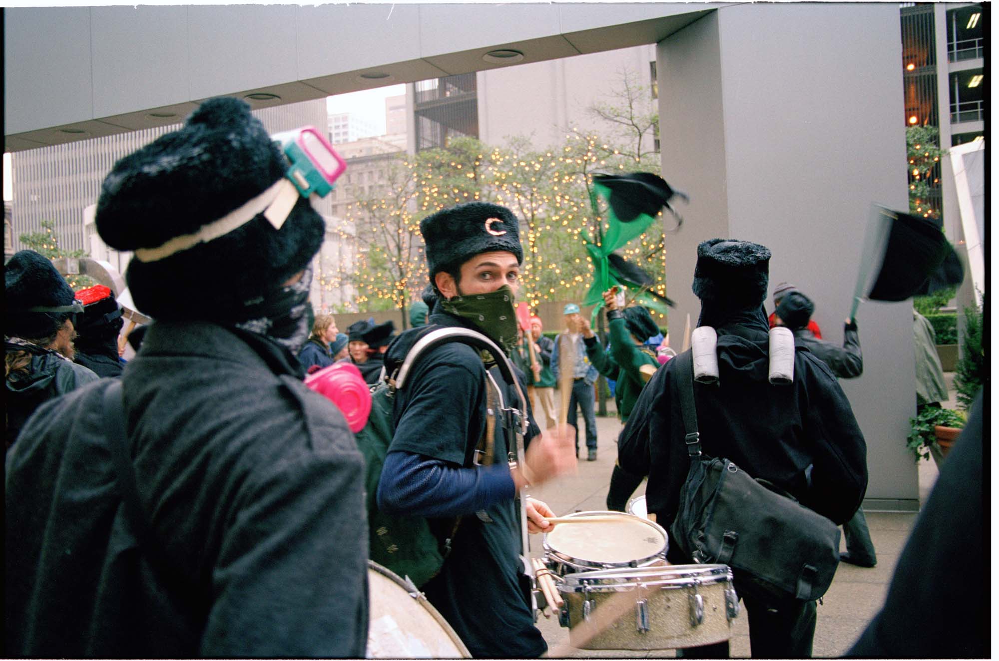 Image of Infernal Noise Brigade marching in the WTO protests, Seattle, November 30, 1999