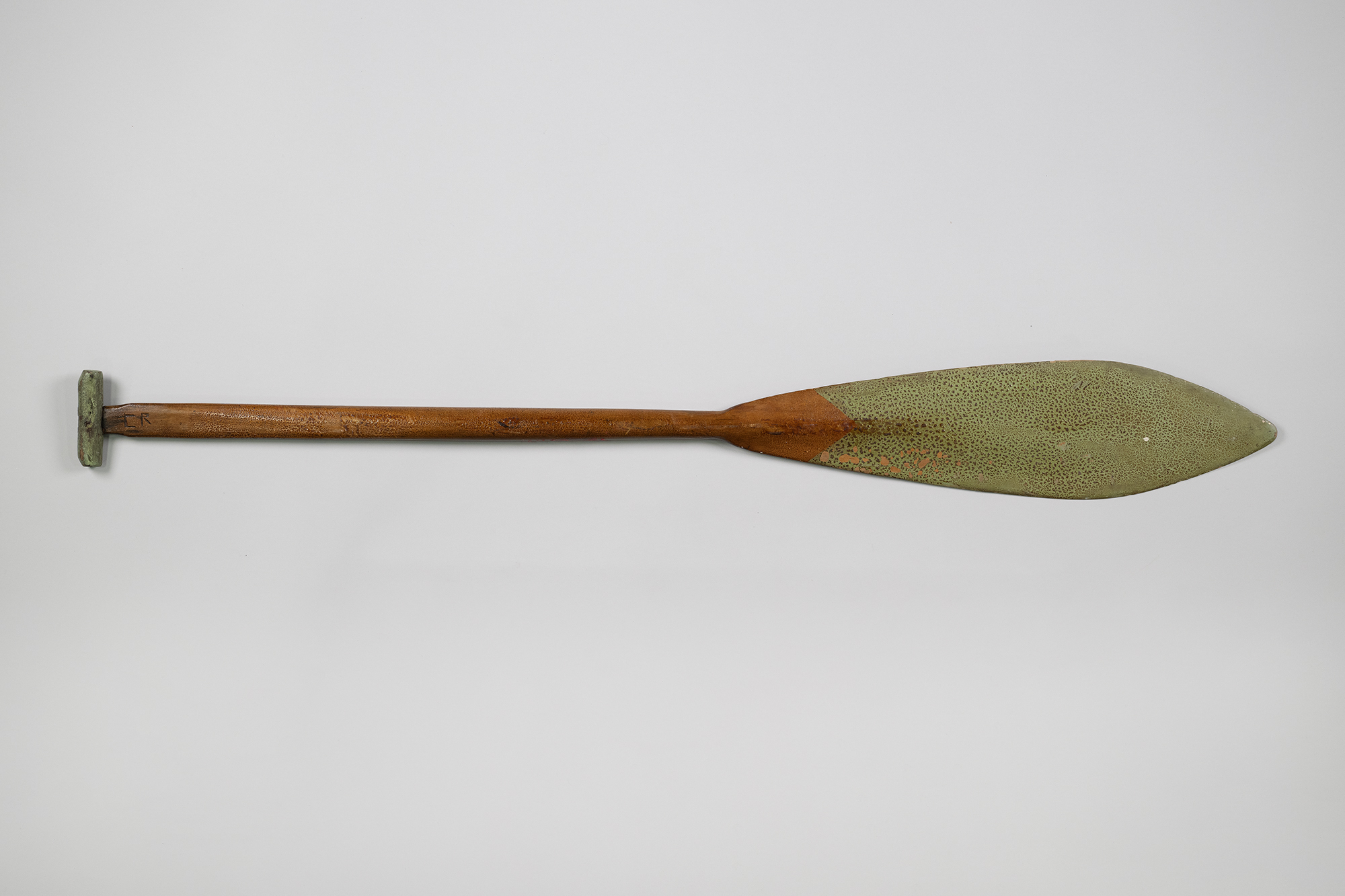 Image of Canoe paddle carved by Emmett Oliver (Swinomish), 1934