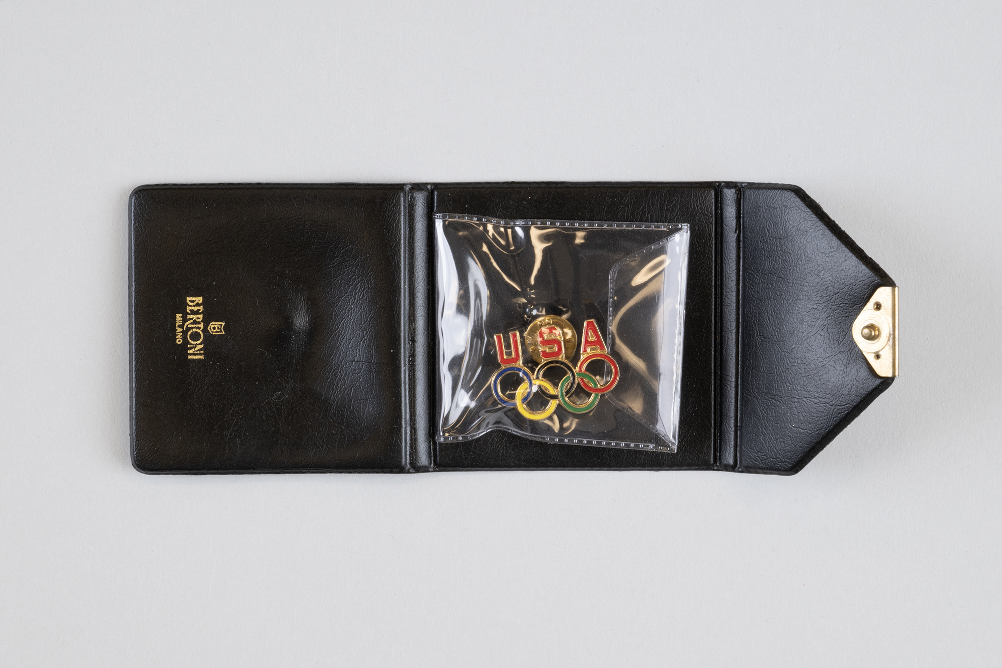 Image of Joe Rantz's USA Olympic pin in black case, 1936