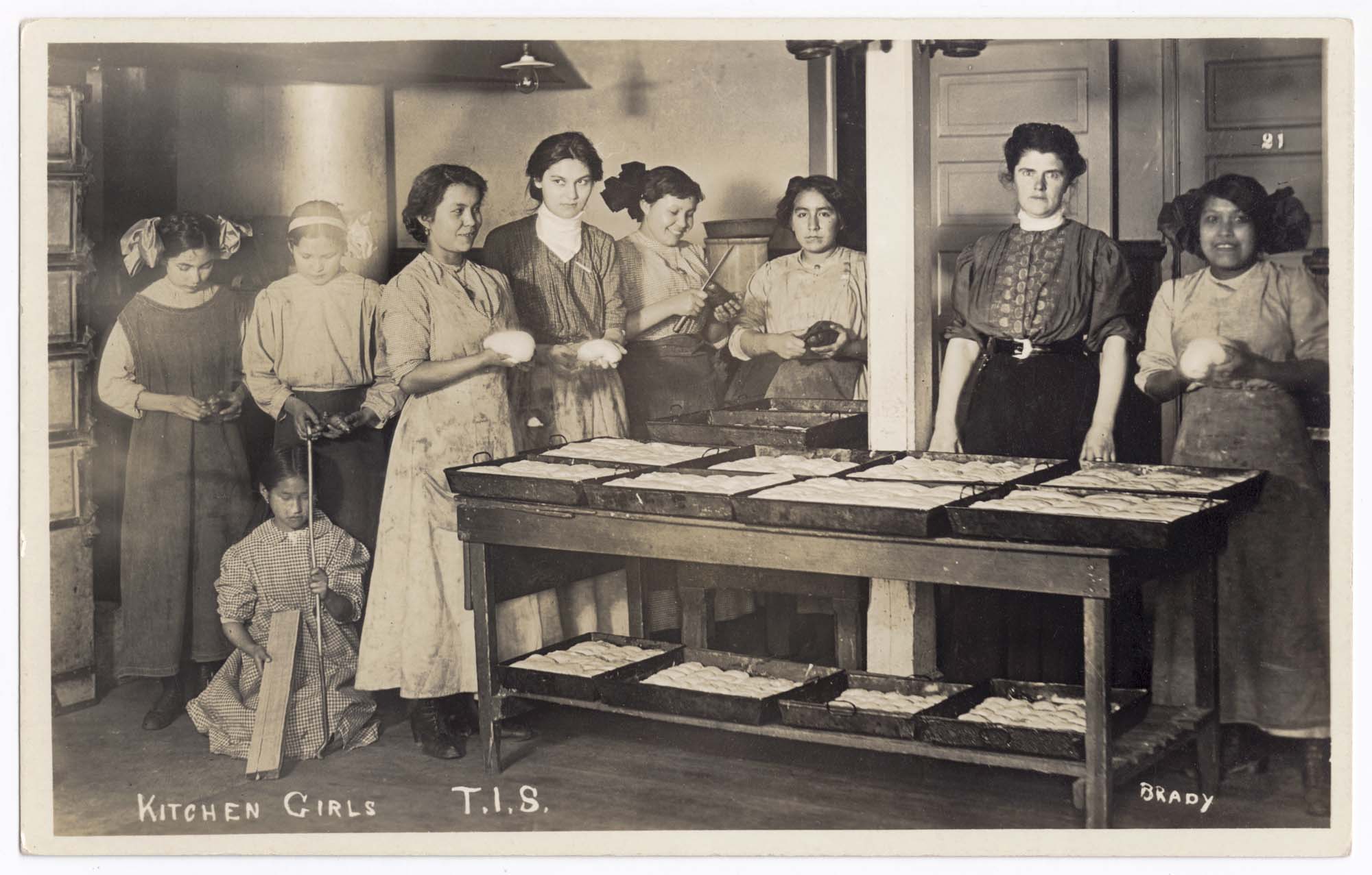 Image of Young women working in kitchen, Tulalip Indian School, circa 1912