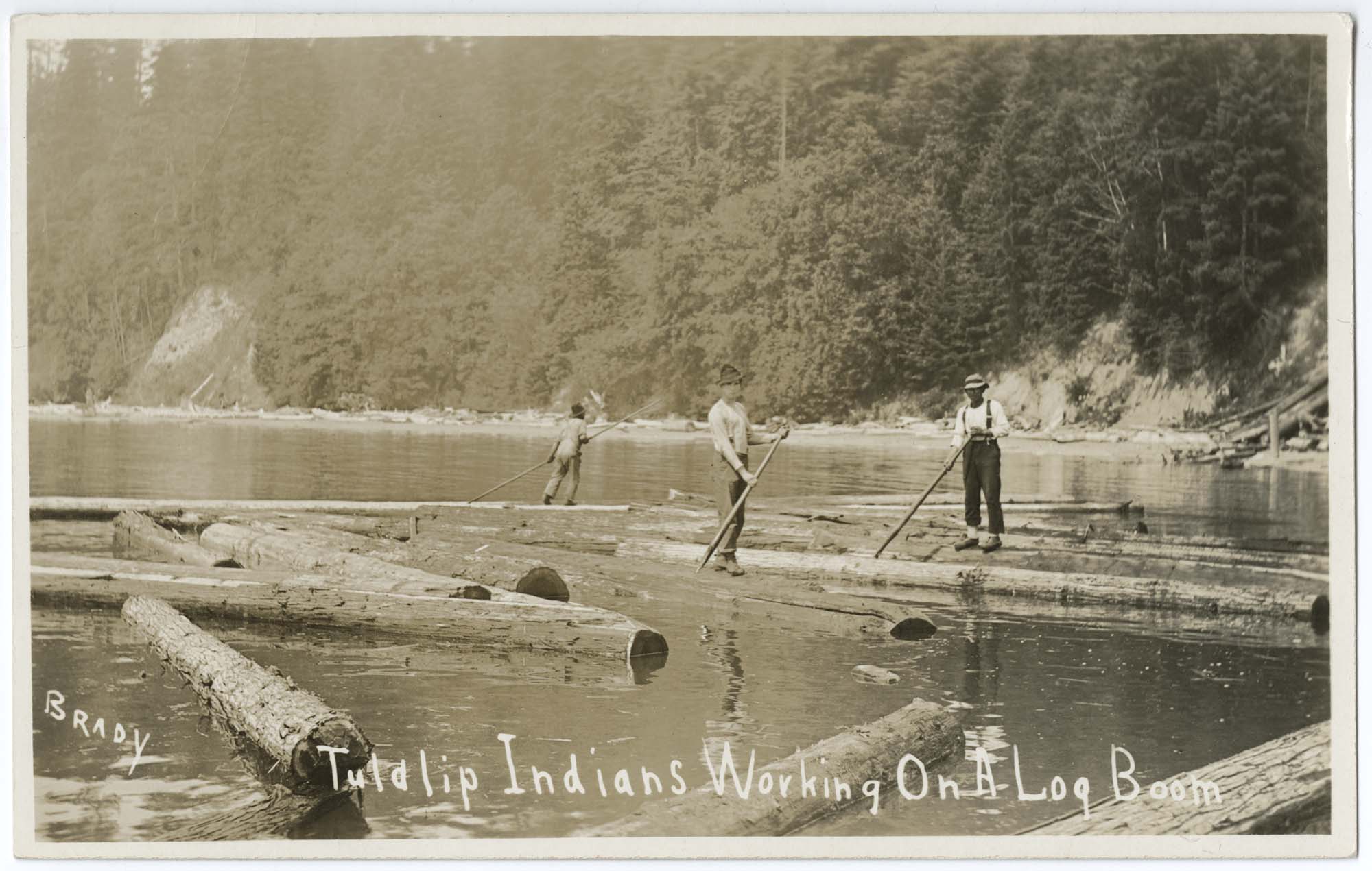 Image of Tulalip men working on a log boom, circa 1912