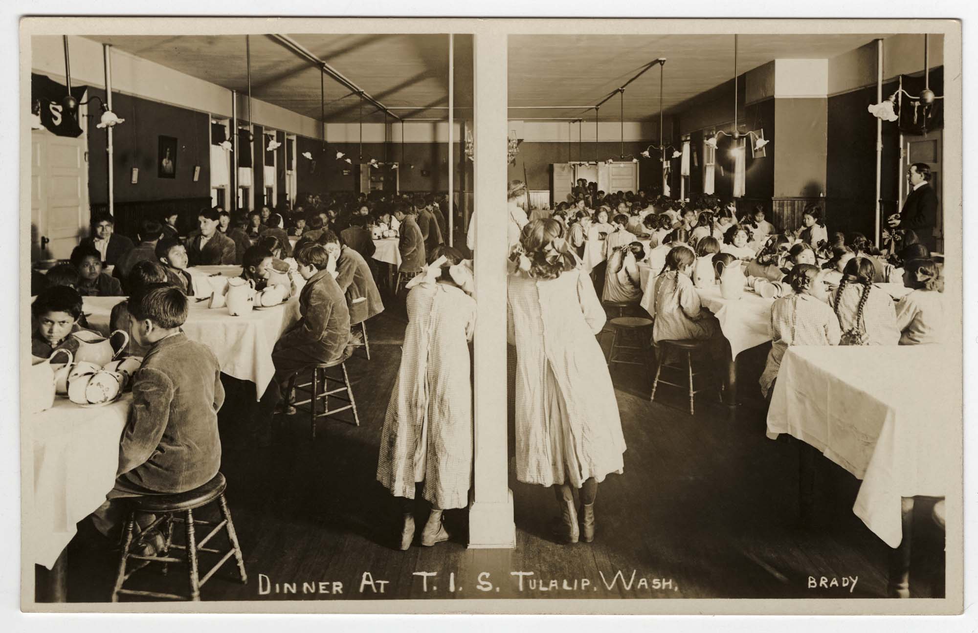 Image of Children eating dinner at Tulalip Indian School, circa 1912