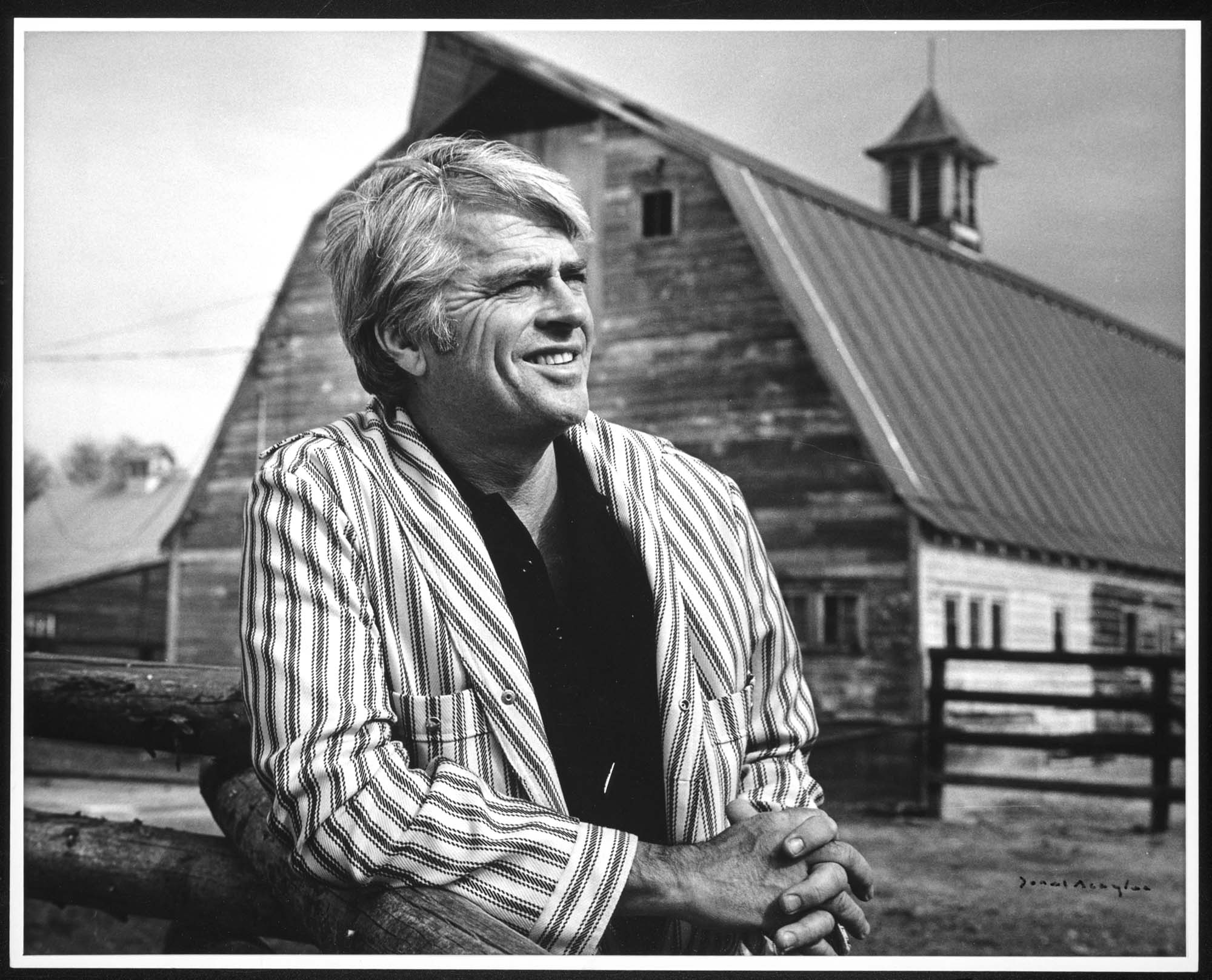 Image of Jack Barron standing in front of barn, 1978