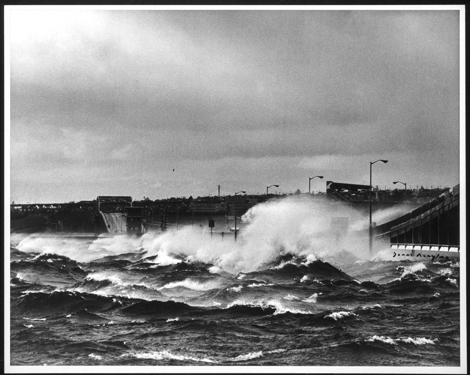 Image of Waves crashing against Evergreen Point Bridge during a storm, Medina, 1970