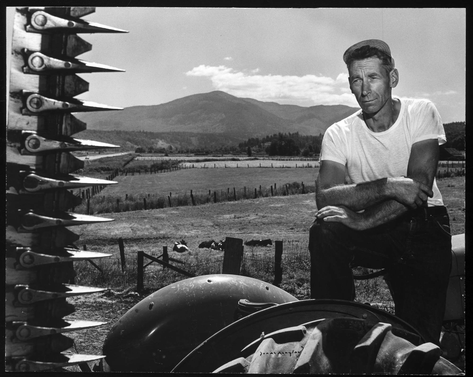 Image of Dairy farmer Elvin Barlow, Issaquah, 1953