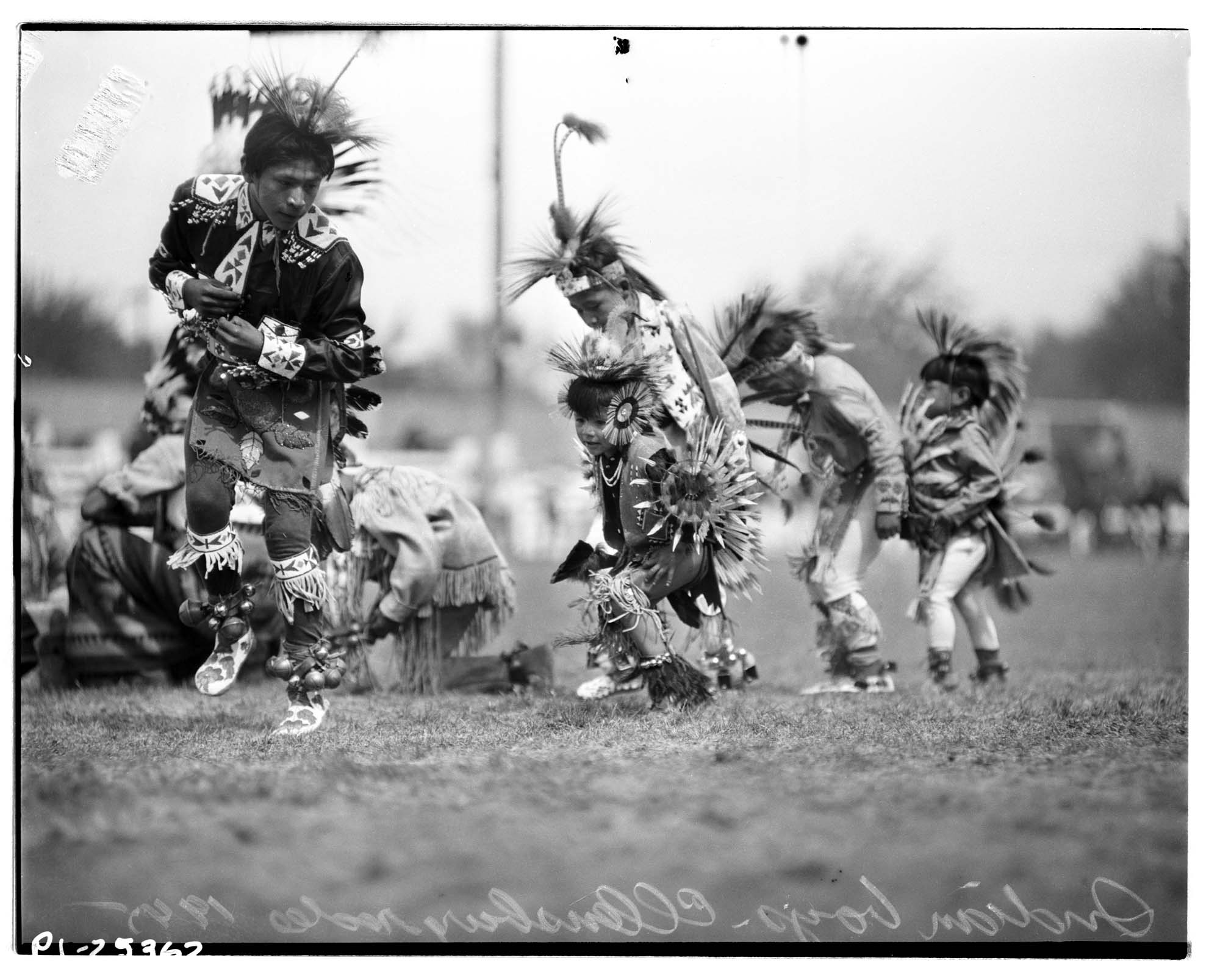 Image of Indigenous dancers fancy dancing at the Ellensburg Rodeo, September 1945