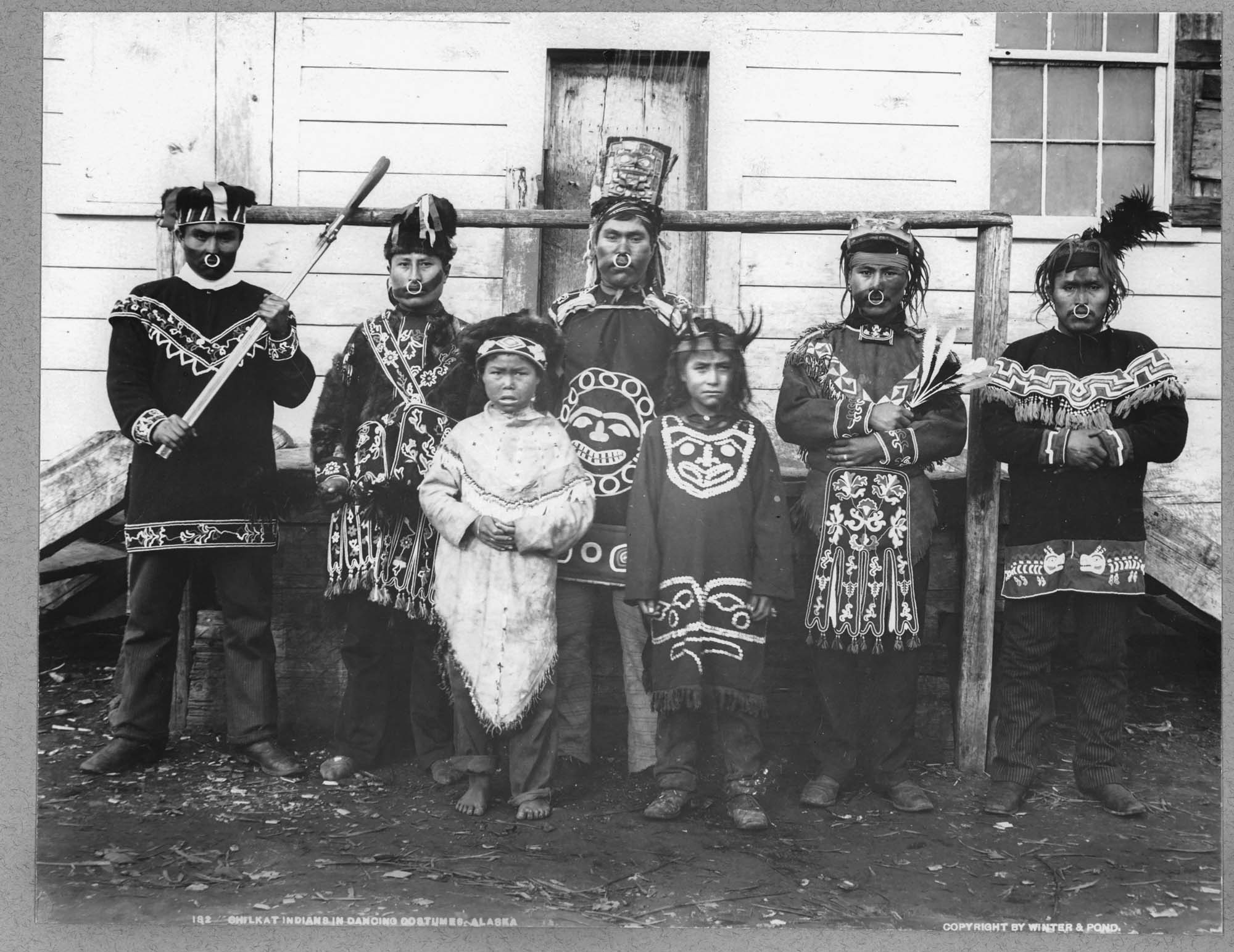 Image of Chilkat people in dance costumes, Klukwan, Alaska, circa 1895