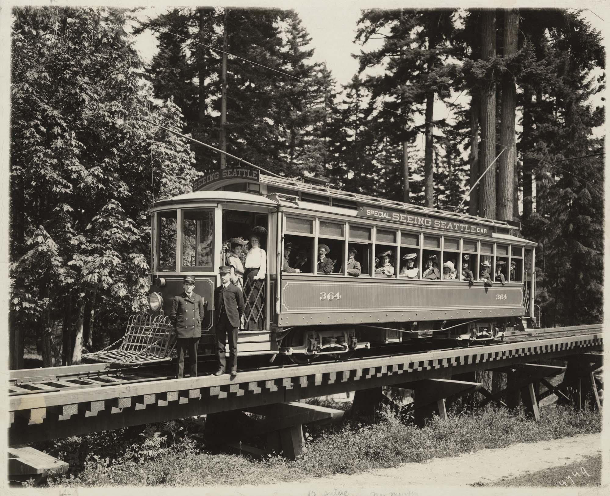 Image of Seattle trolley car on trestle, Woodland Park, circa 1910
