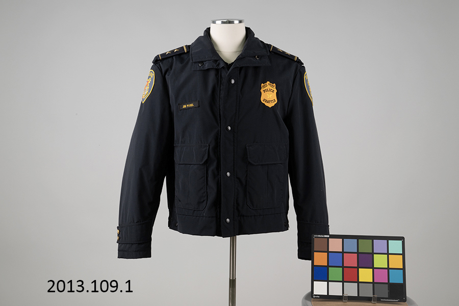 Image of Seattle Police Department jacket worn by Captain Jim Pugel during the World Trade Center (WTO) conference and protests in Seattle, 1999