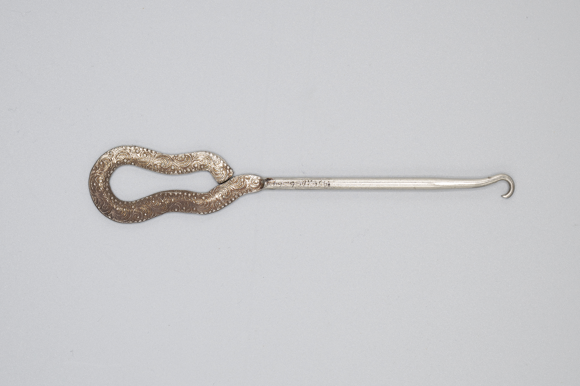 Image of Buttonhook from Nordstrom's shoe store, ca. 1900