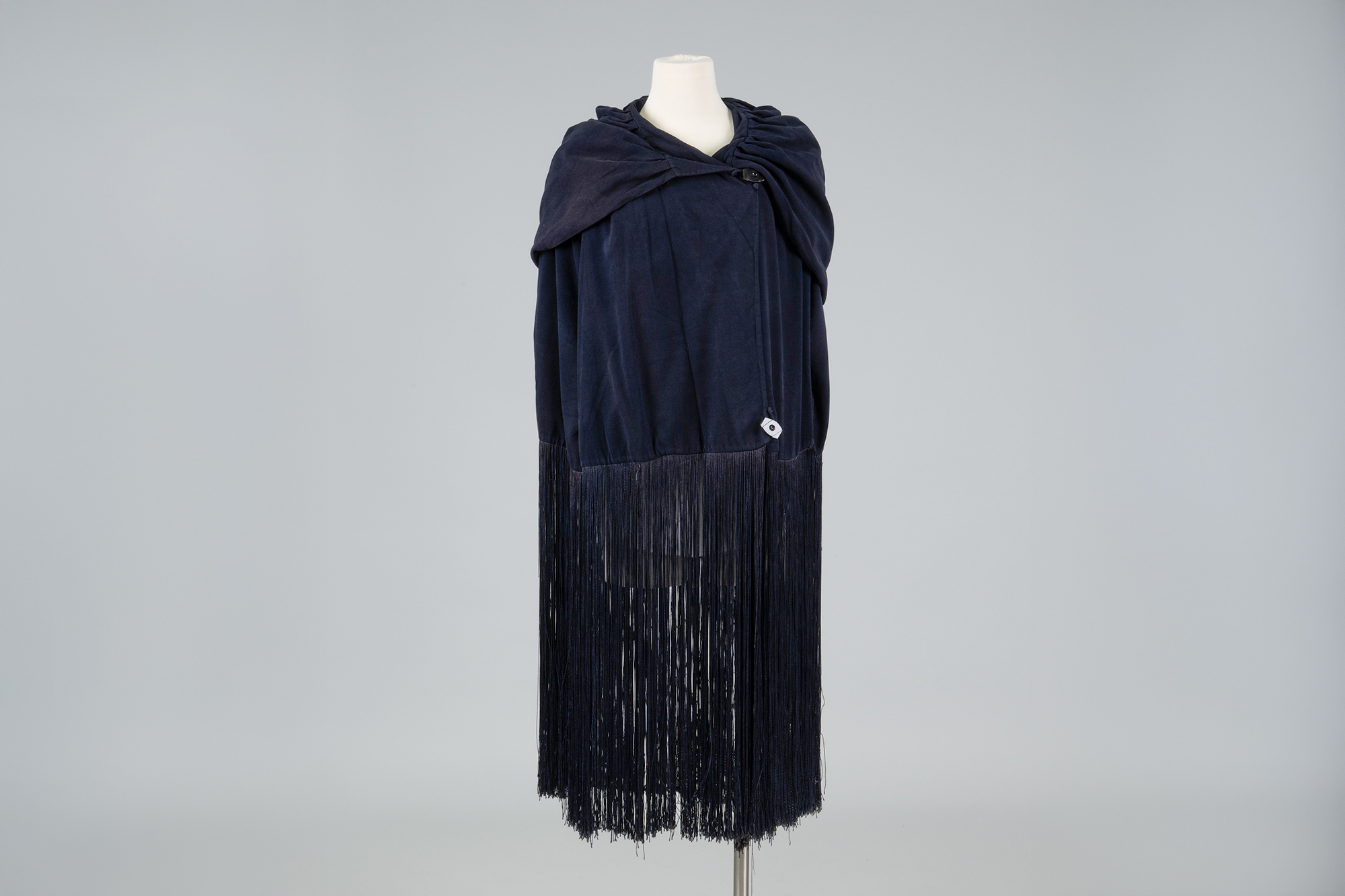 Image of Blue cape with long fringe from J.S. Graham, 1924
