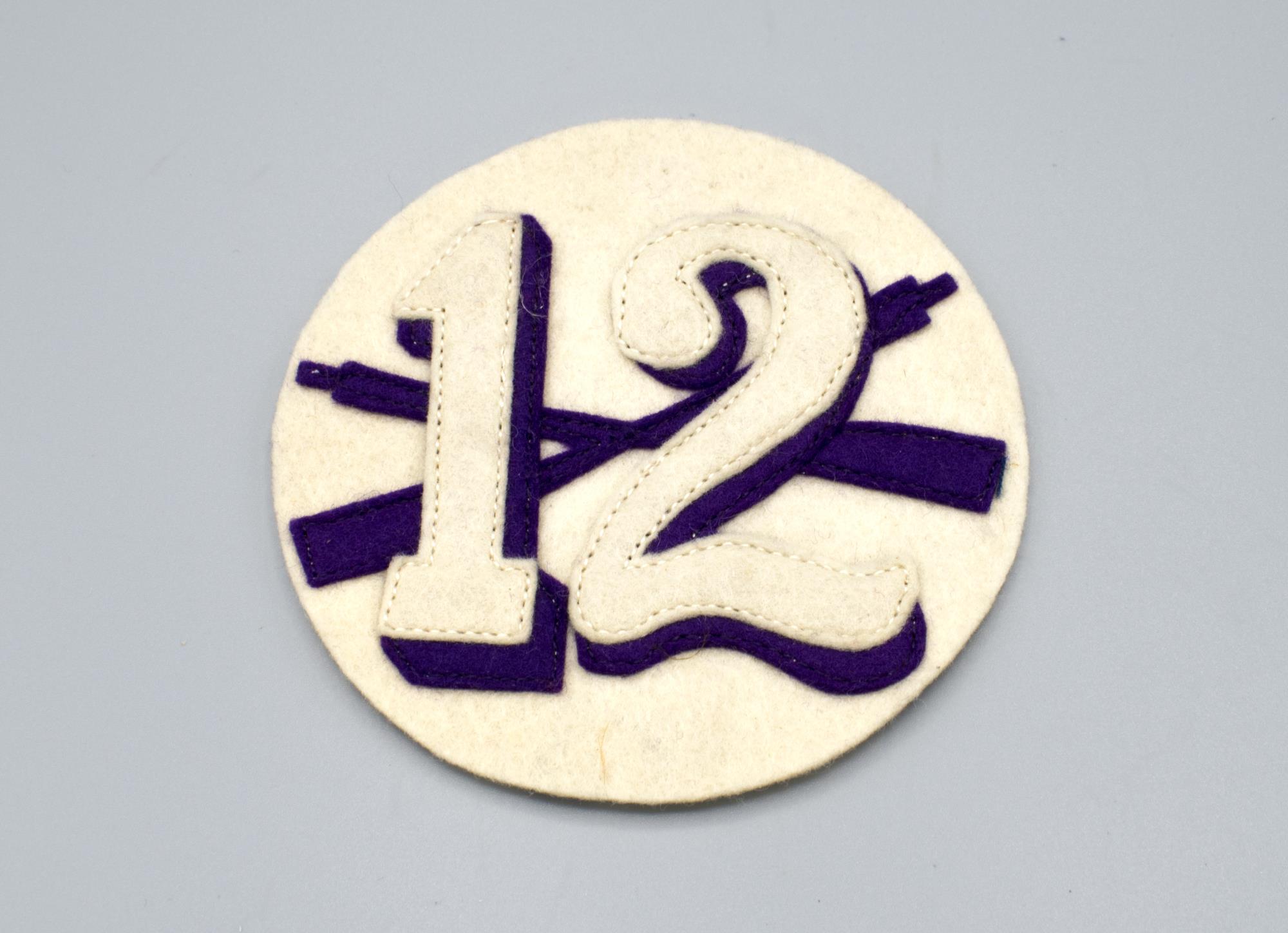 Image of Racing crew letter patch, from the University of Washington, 1912