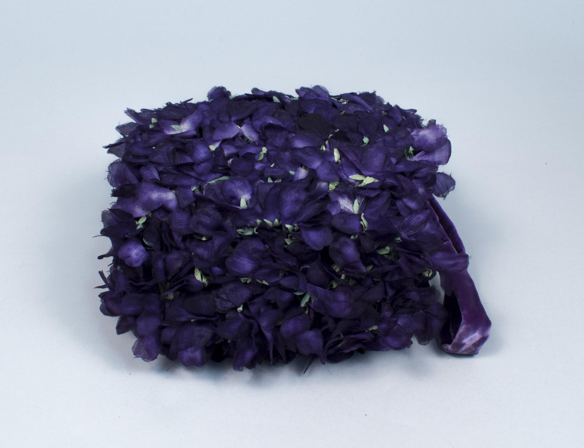 Image of Muff covered with silk violets, ca. 1900