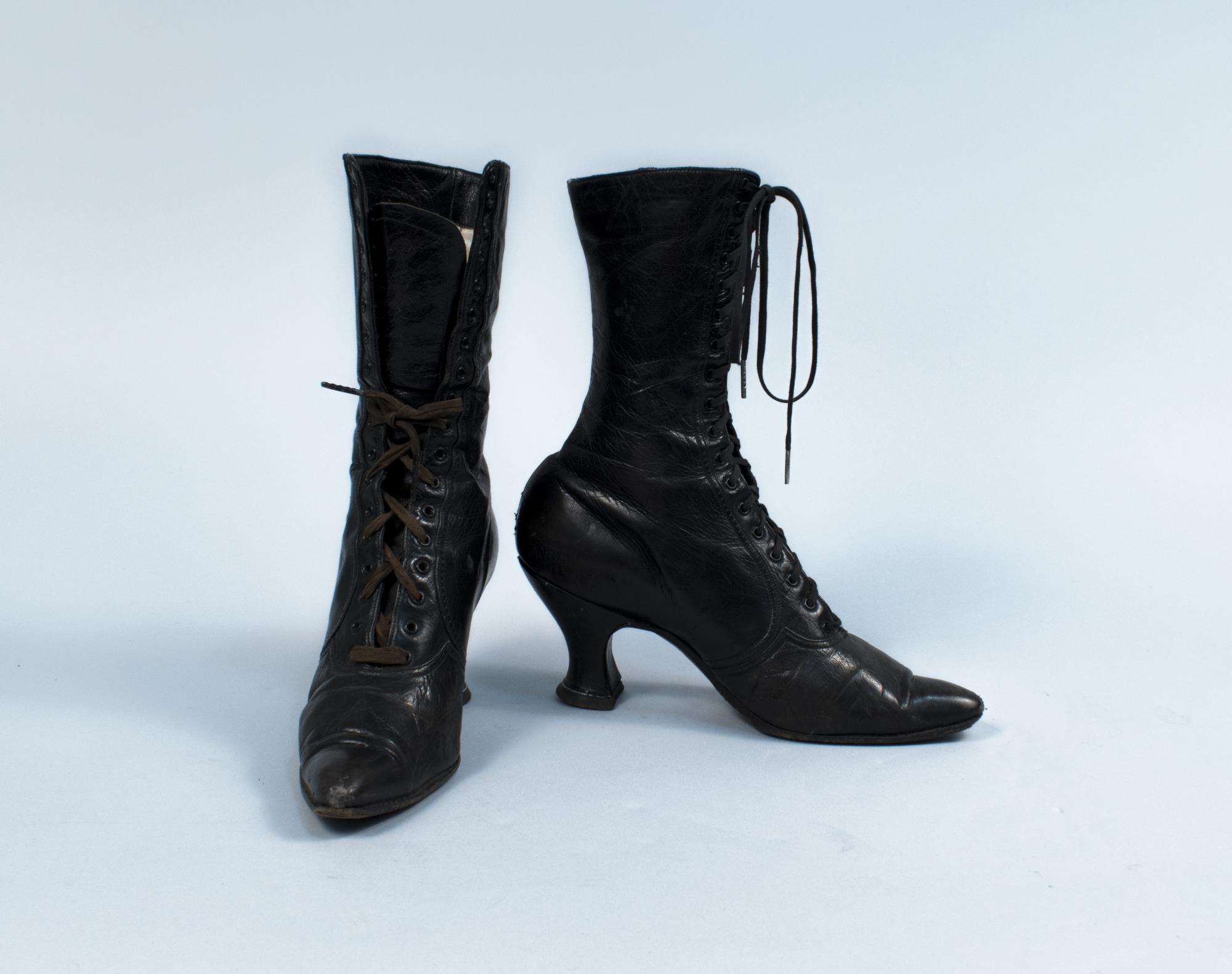 Image of Black leather high topped laced shoes, ca. 1905