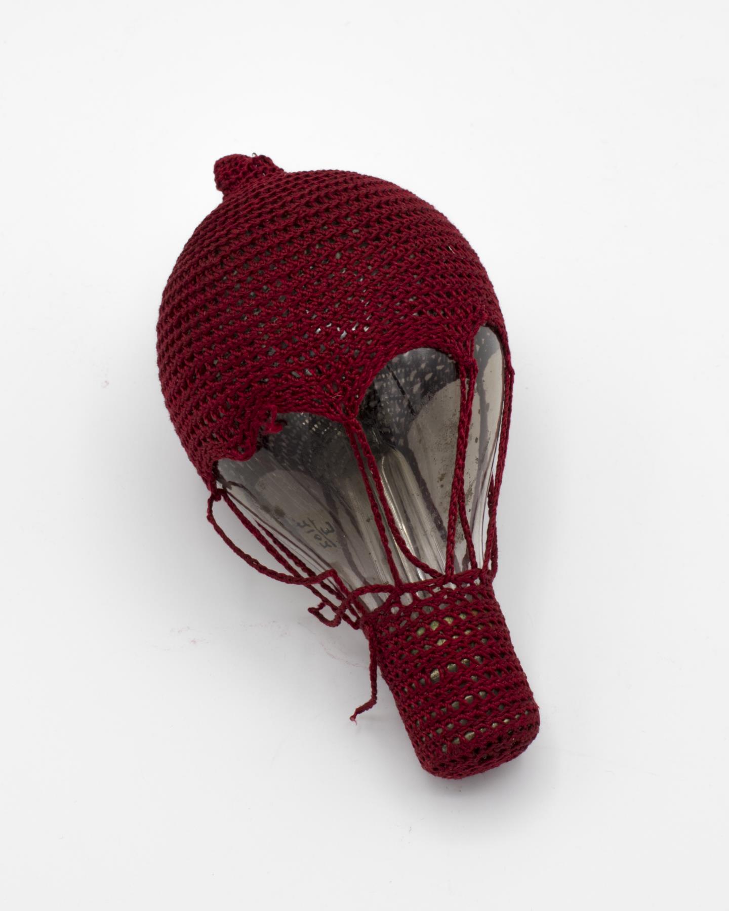 Image of Electric light globe, one of the first in Seattle and encased in crocheted 