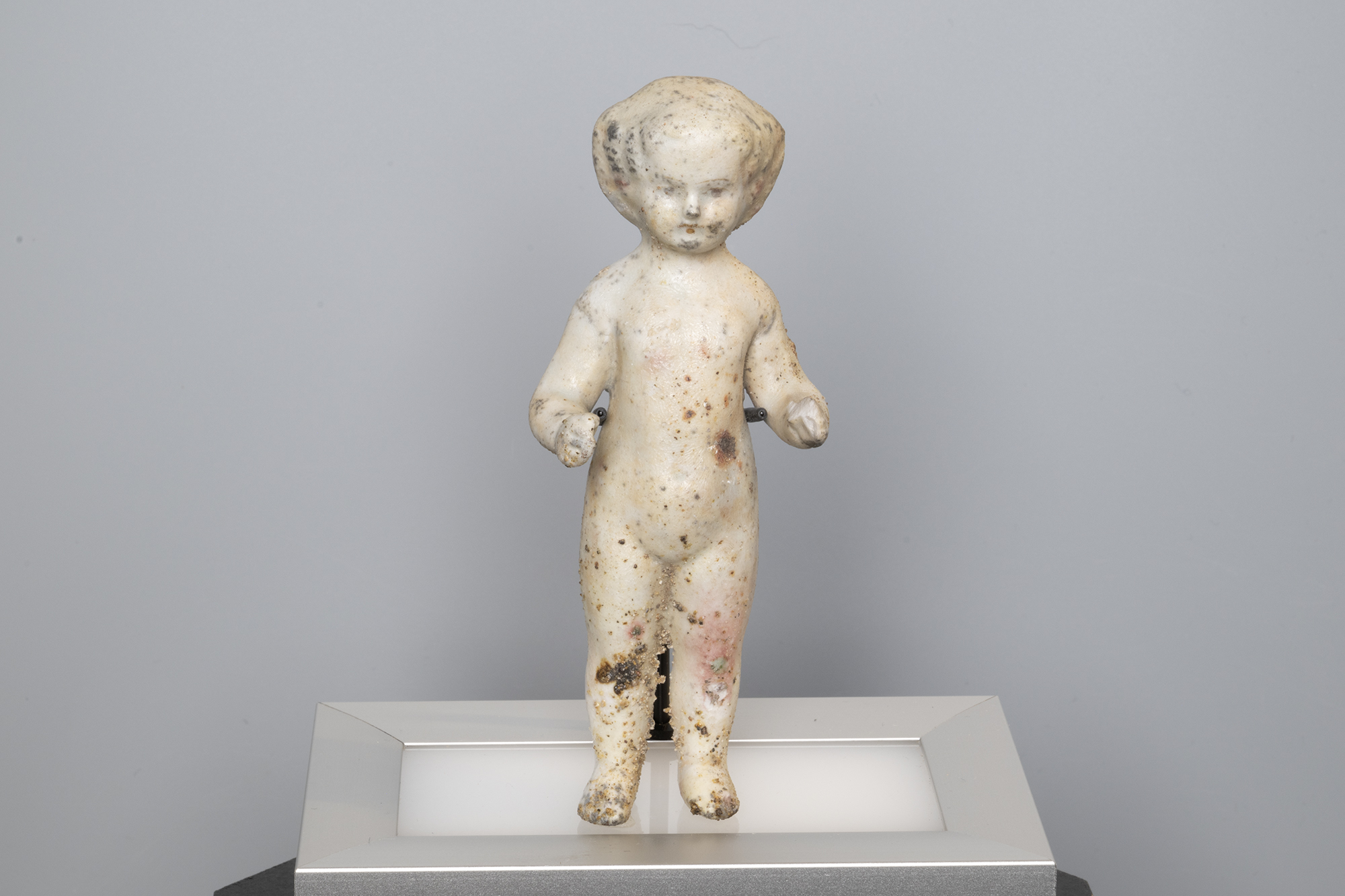 Image of China doll found by Frank H. Davidson during the Seattle Fire of 1889
