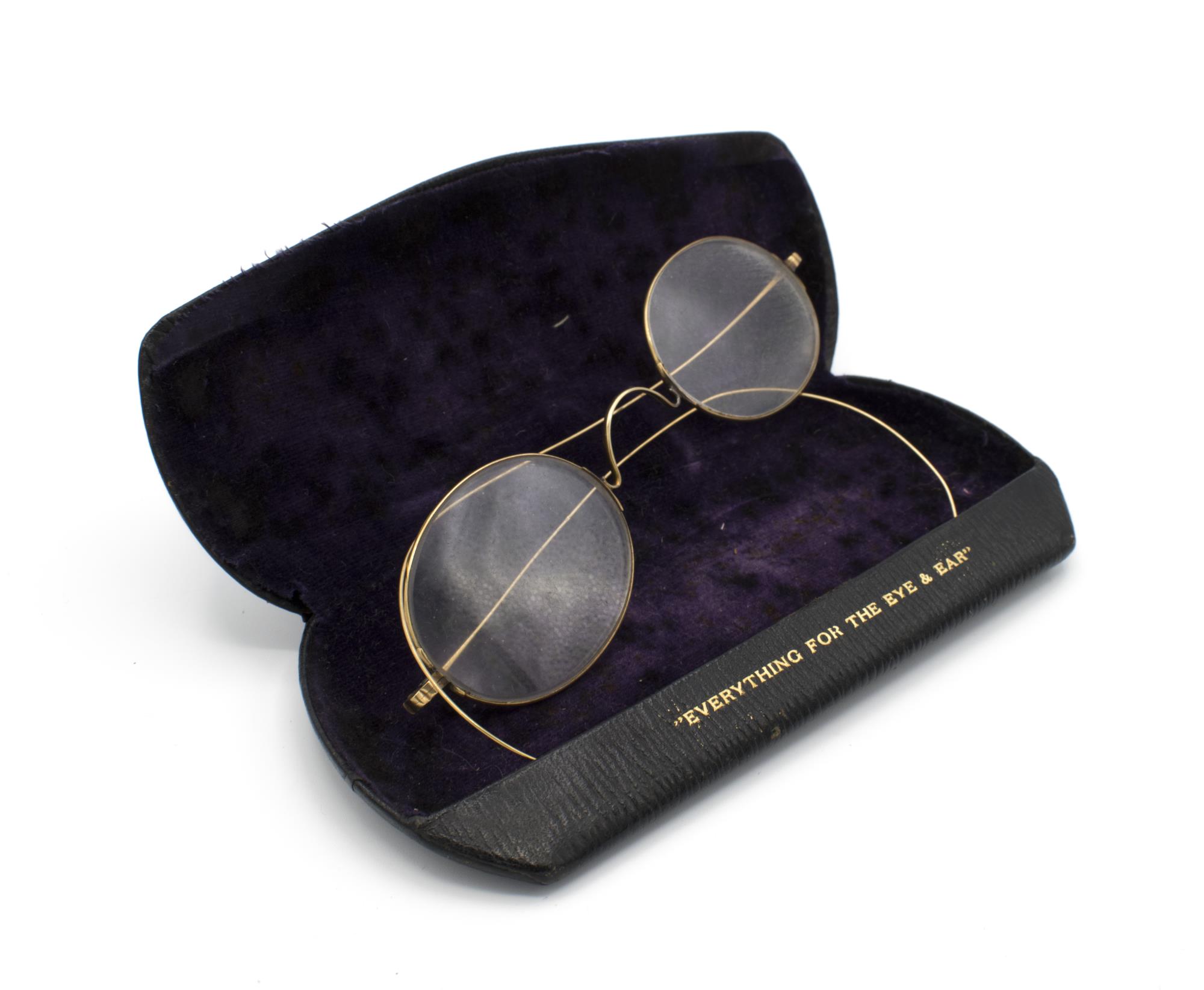 Image of Gold-rimmed oval glasses from Seattle Optical Co., ca. 1900-1920