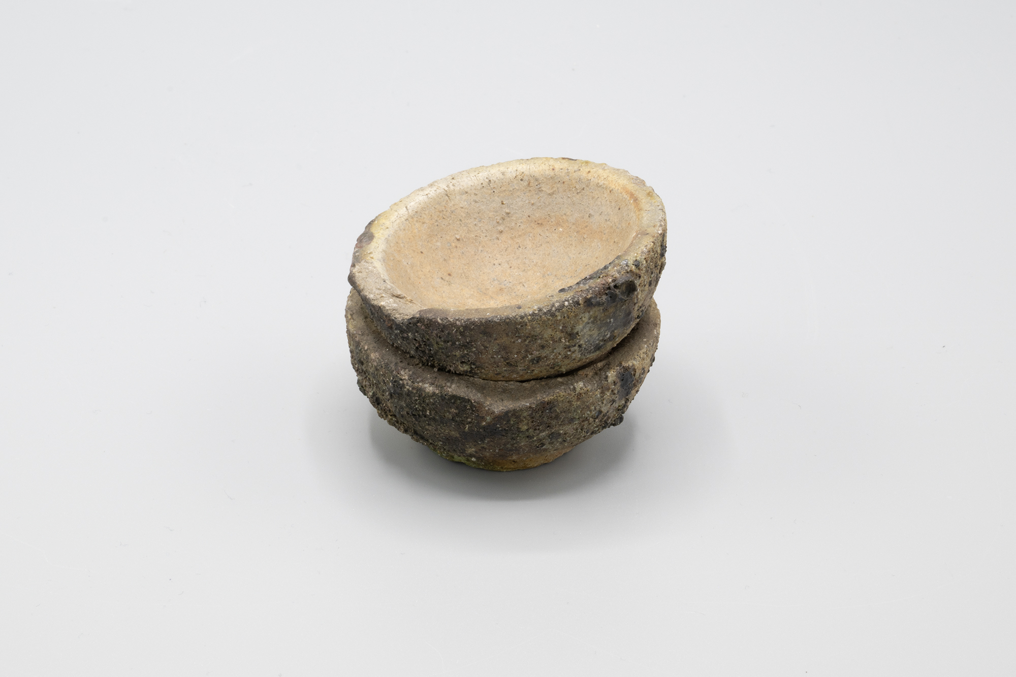 Image of Cupels used for assay work that melted together from the Seattle Fire of 1889