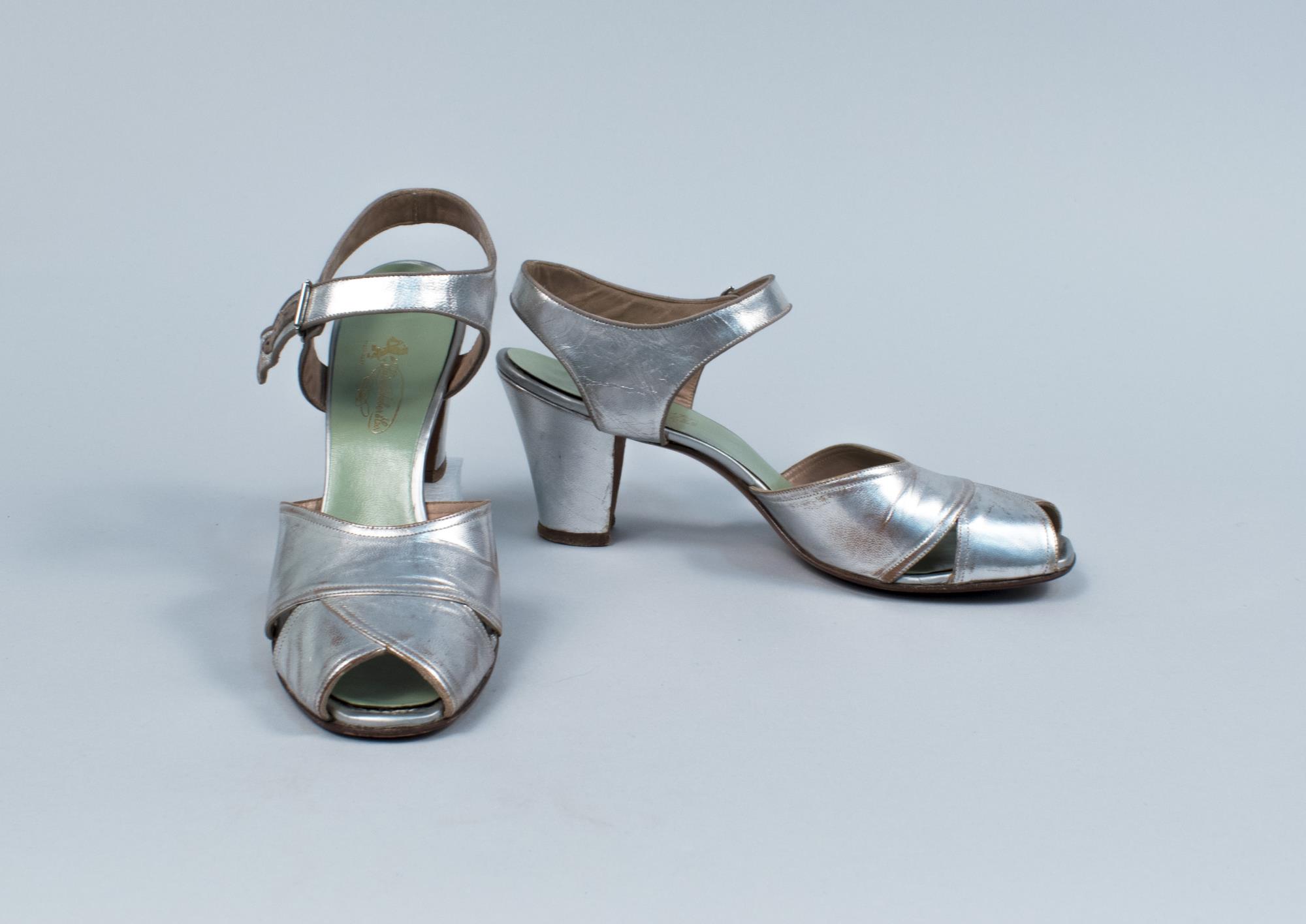 Image of Pair of silver open-toed shoes, ca. 1940s-1950s