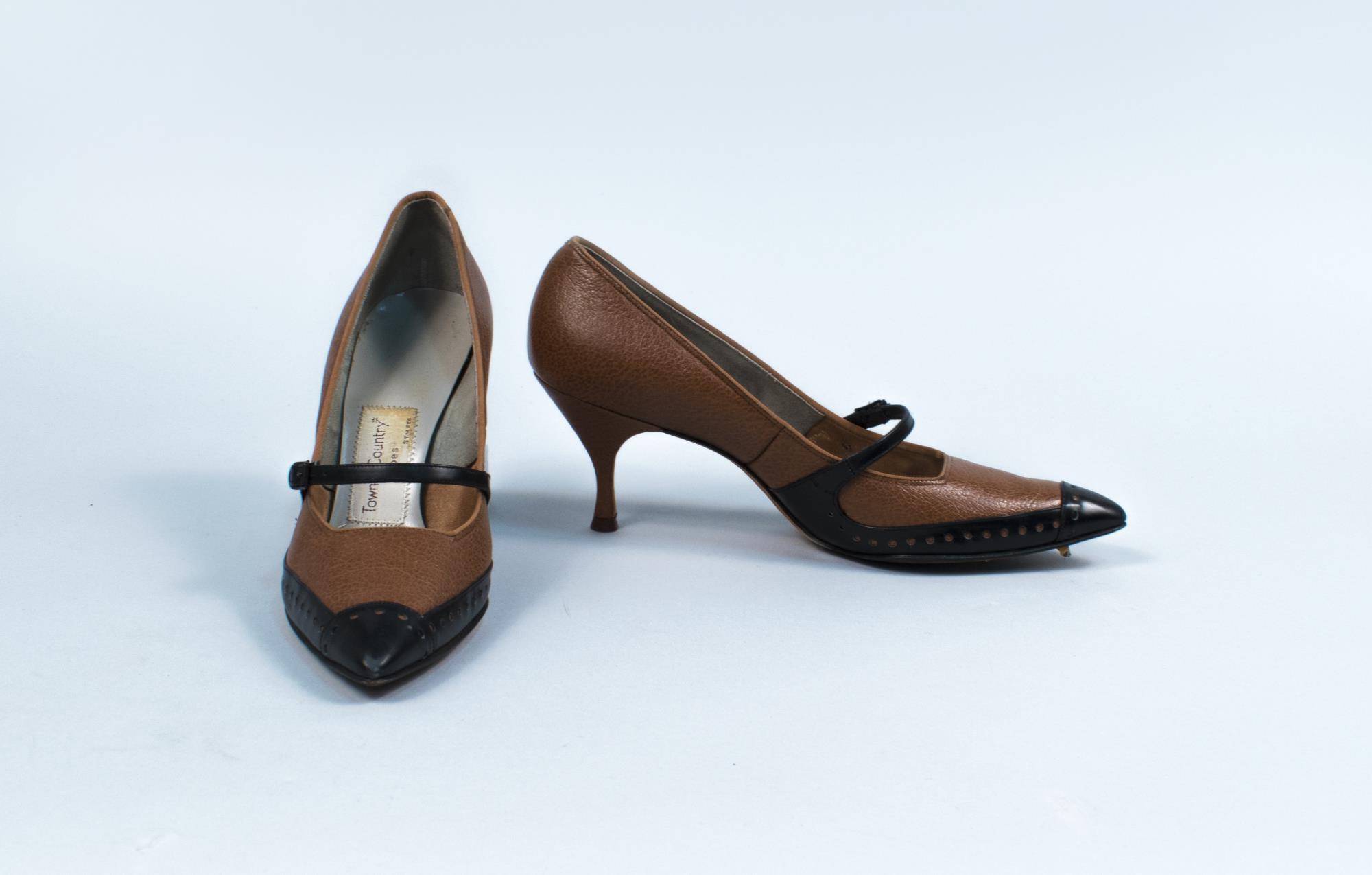 Image of Pair of tan and black pumps, worn as part of Century 21 Seattle World's Fair Fashion Show, 1962