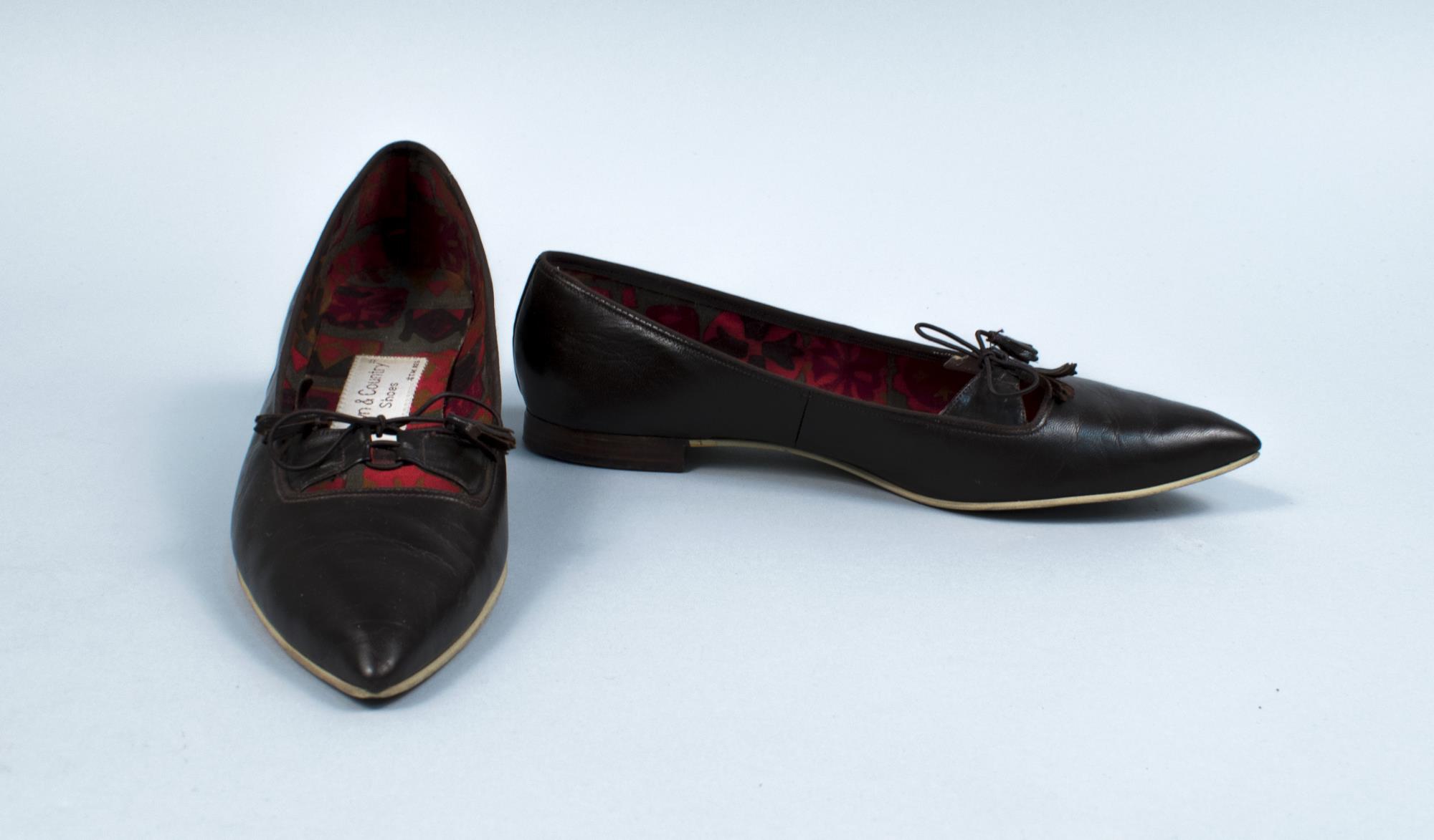 Image of Pair of black flat pumps, worn as part of Century 21 Seattle World's Fair Fashion Show, 1962