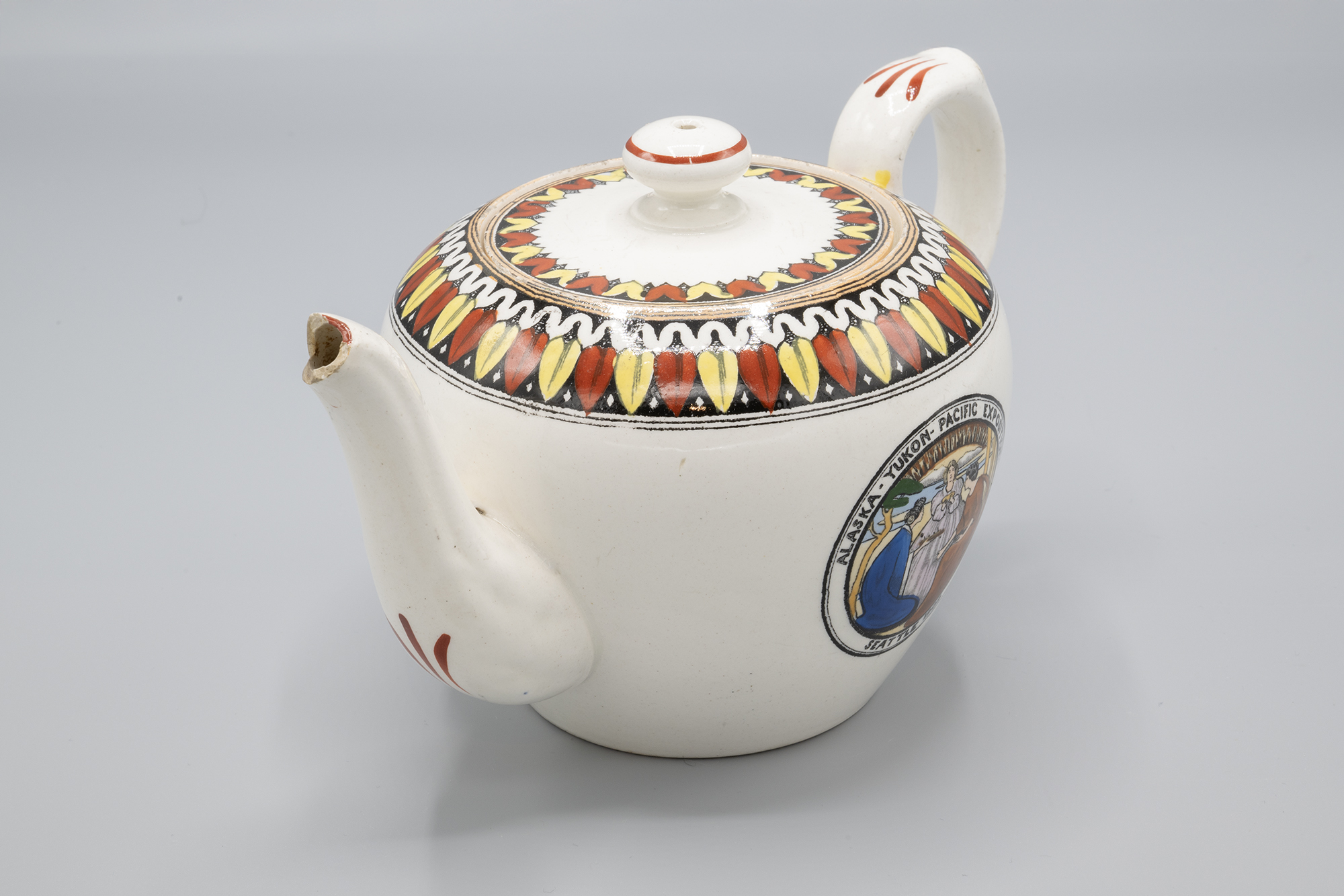 Image of Alaska-Yukon-Pacific Exposition (AYPE) souvenir teapot made for The Bon Marché, 1909