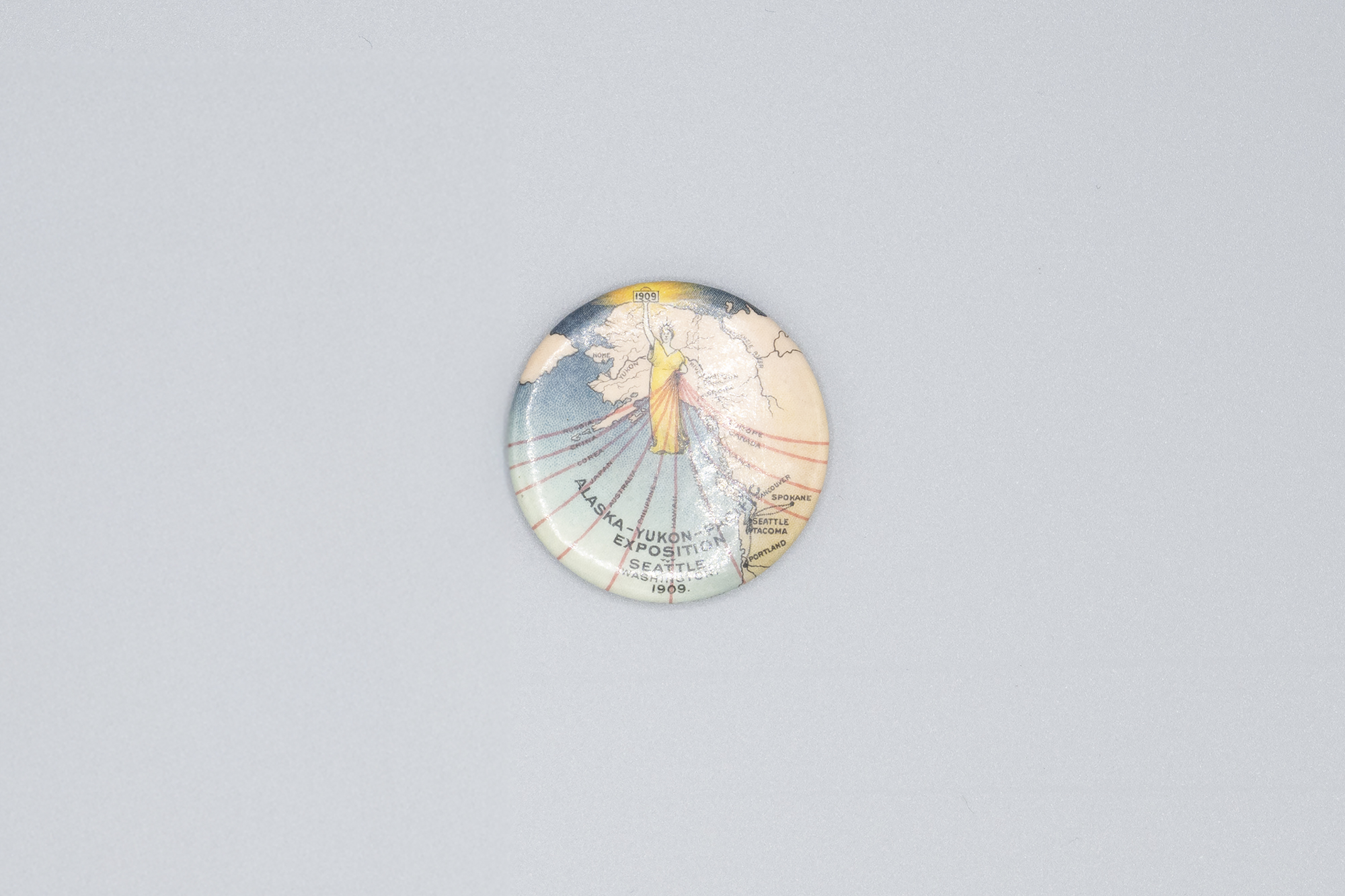 Image of Souvenir pin commemorating the Alaska-Yukon-Pacific Exposition (AYPE), 1909