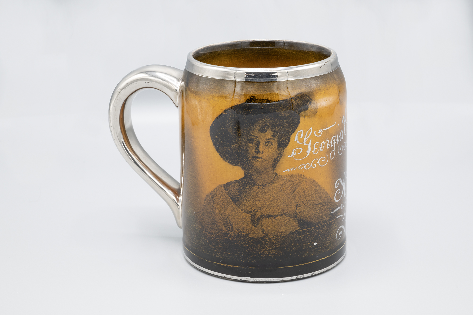 Image of AYPE souvenir mug with image of Georgia C. Brier, 1909