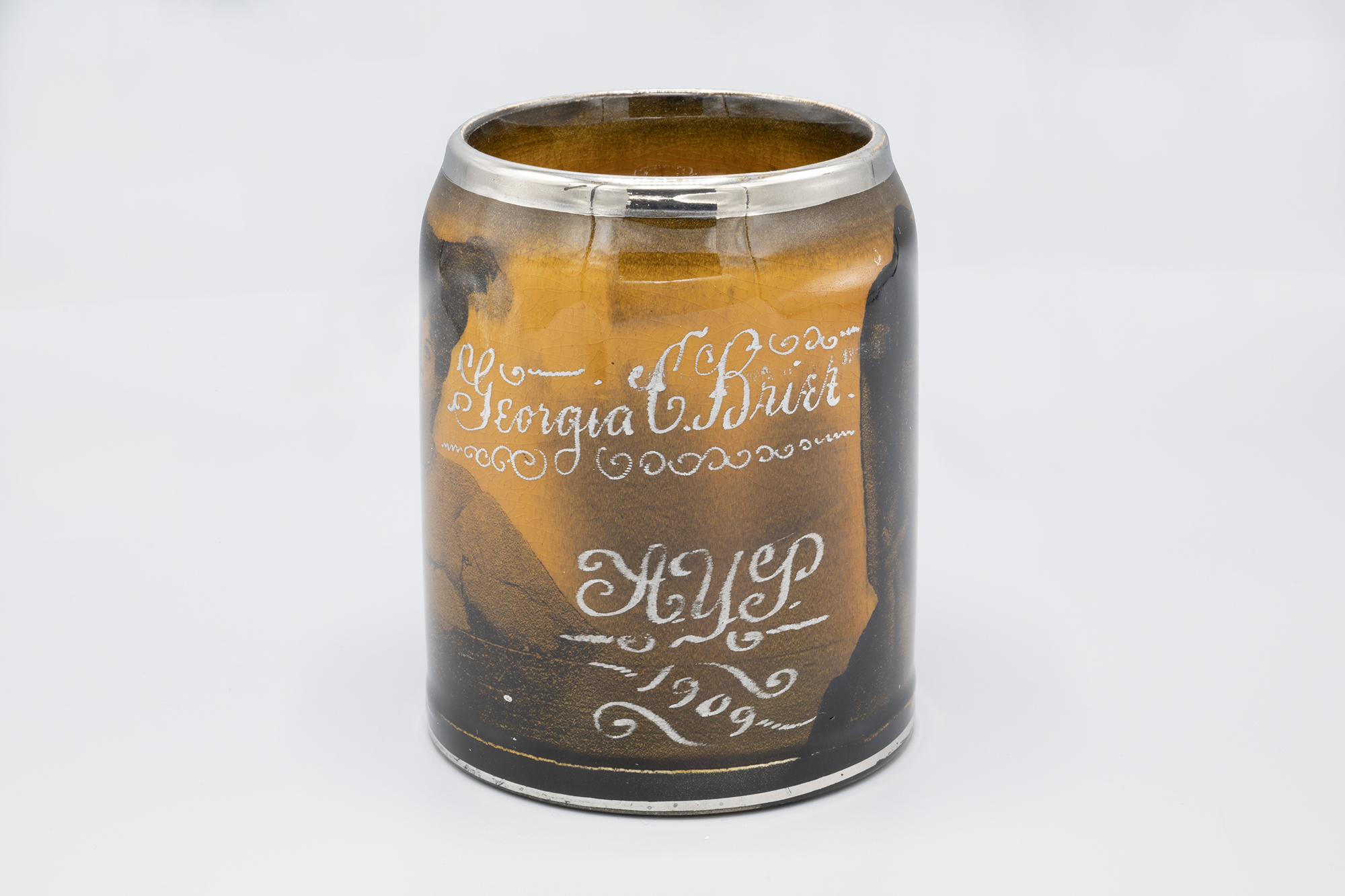 Image of AYPE souvenir mug with image of Georgia C. Brier, 1909