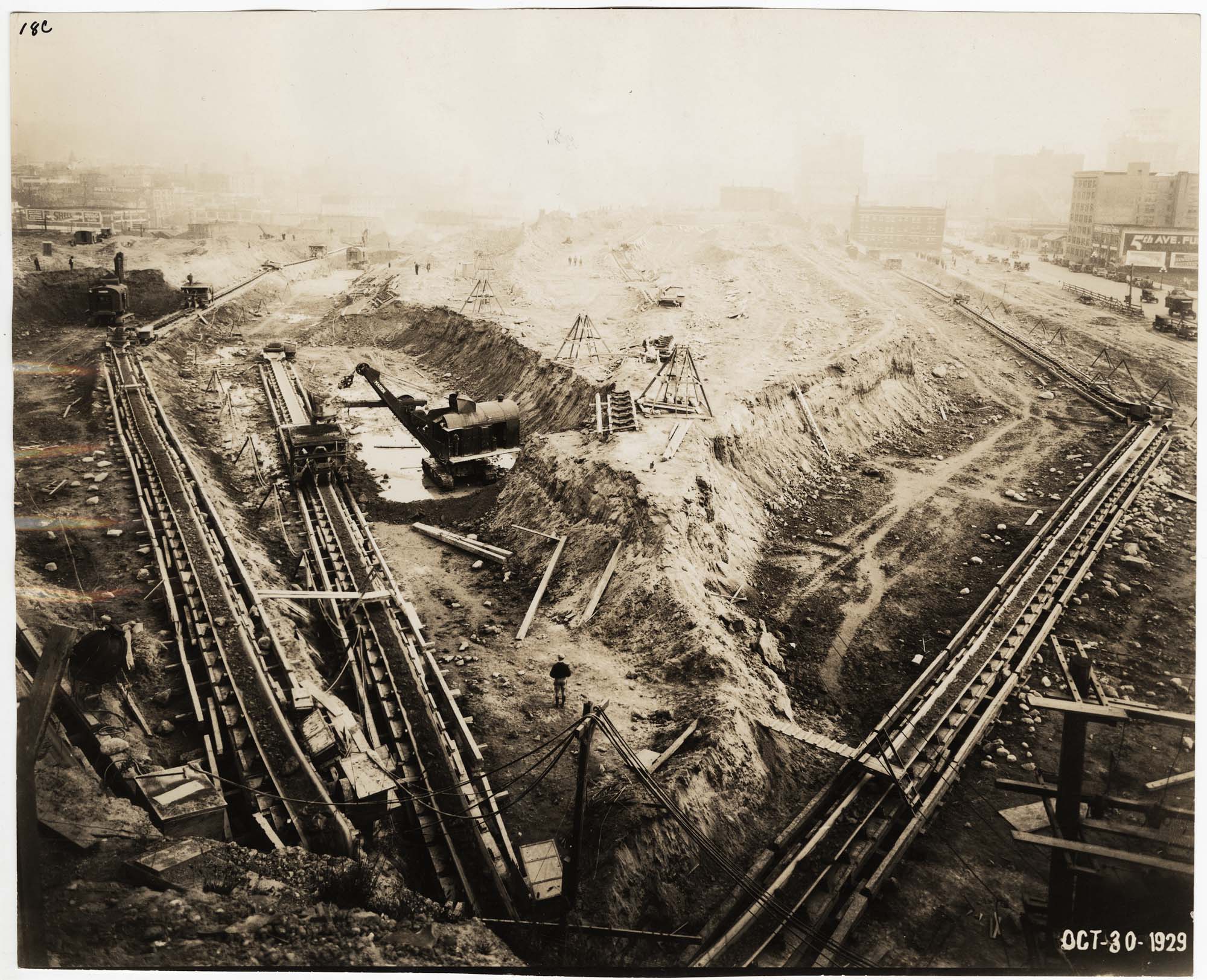 Image of Birdseye view of Denny Hill regrade showing conveyors, looking south from Battery Street near 5th Avenue, October 20, 1929