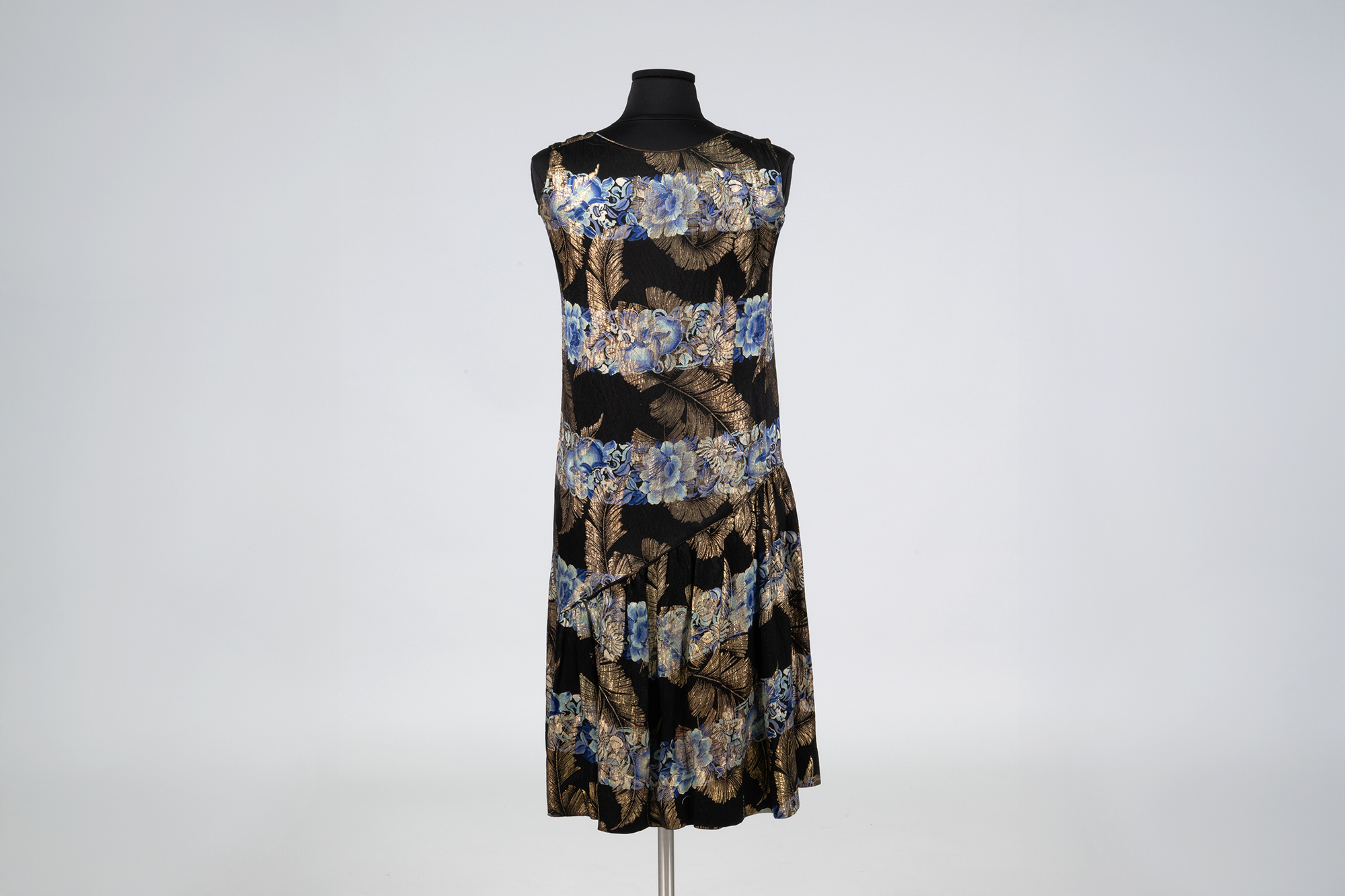 Image of Black dress with metallic floral pattern sold by Helen Igoe, ca. 1929