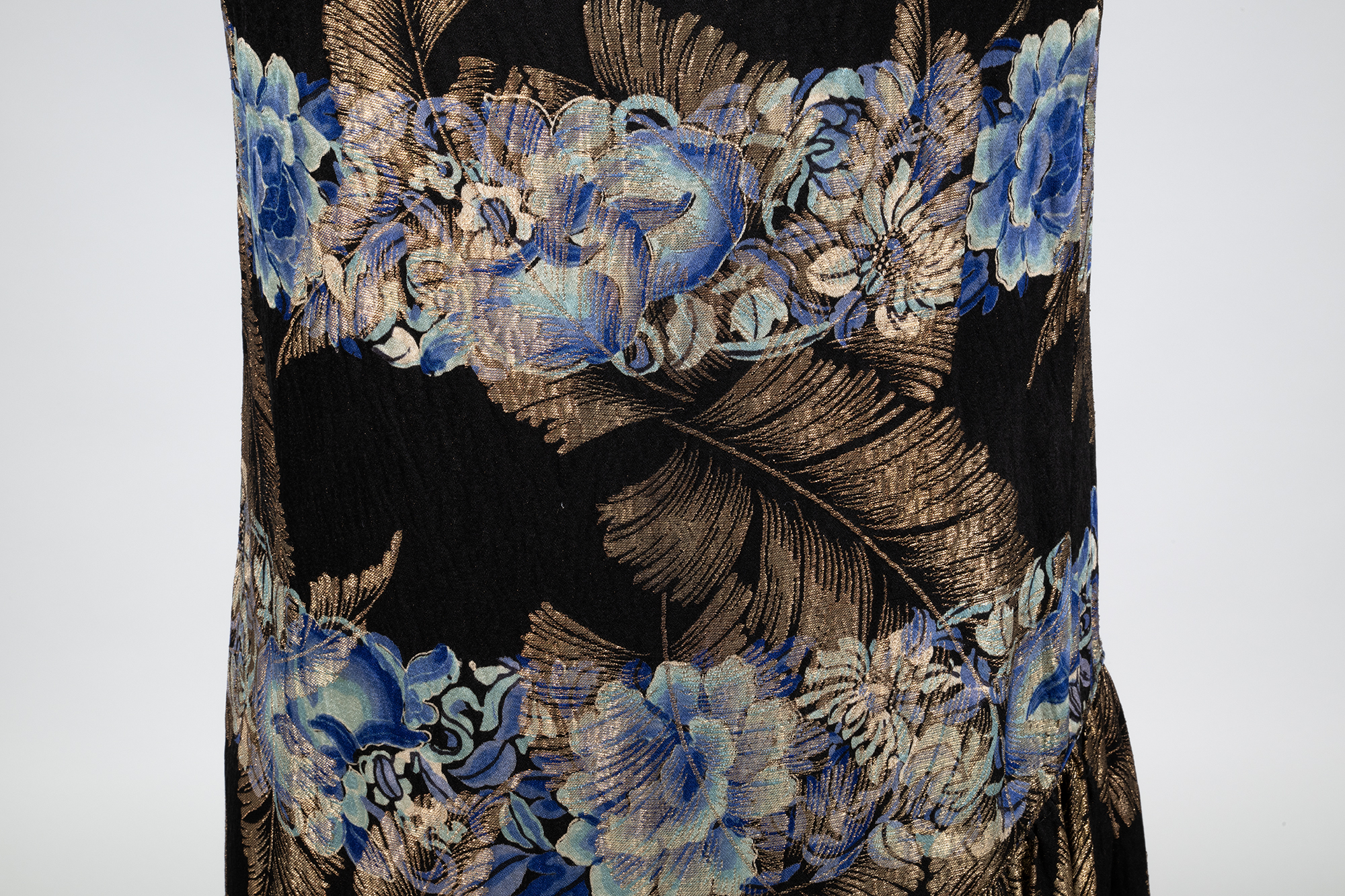 Image of Black dress with metallic floral pattern sold by Helen Igoe, ca. 1929