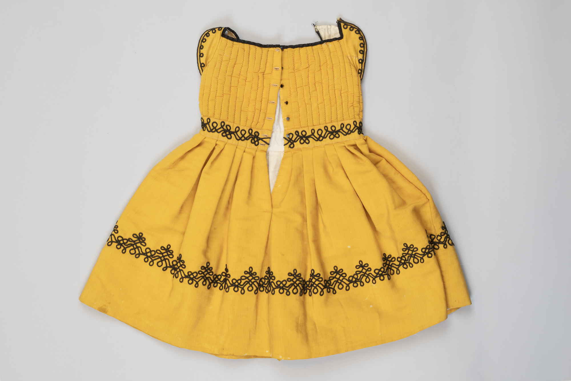 Image of Boy's mustard yellow dress, ca. 1875