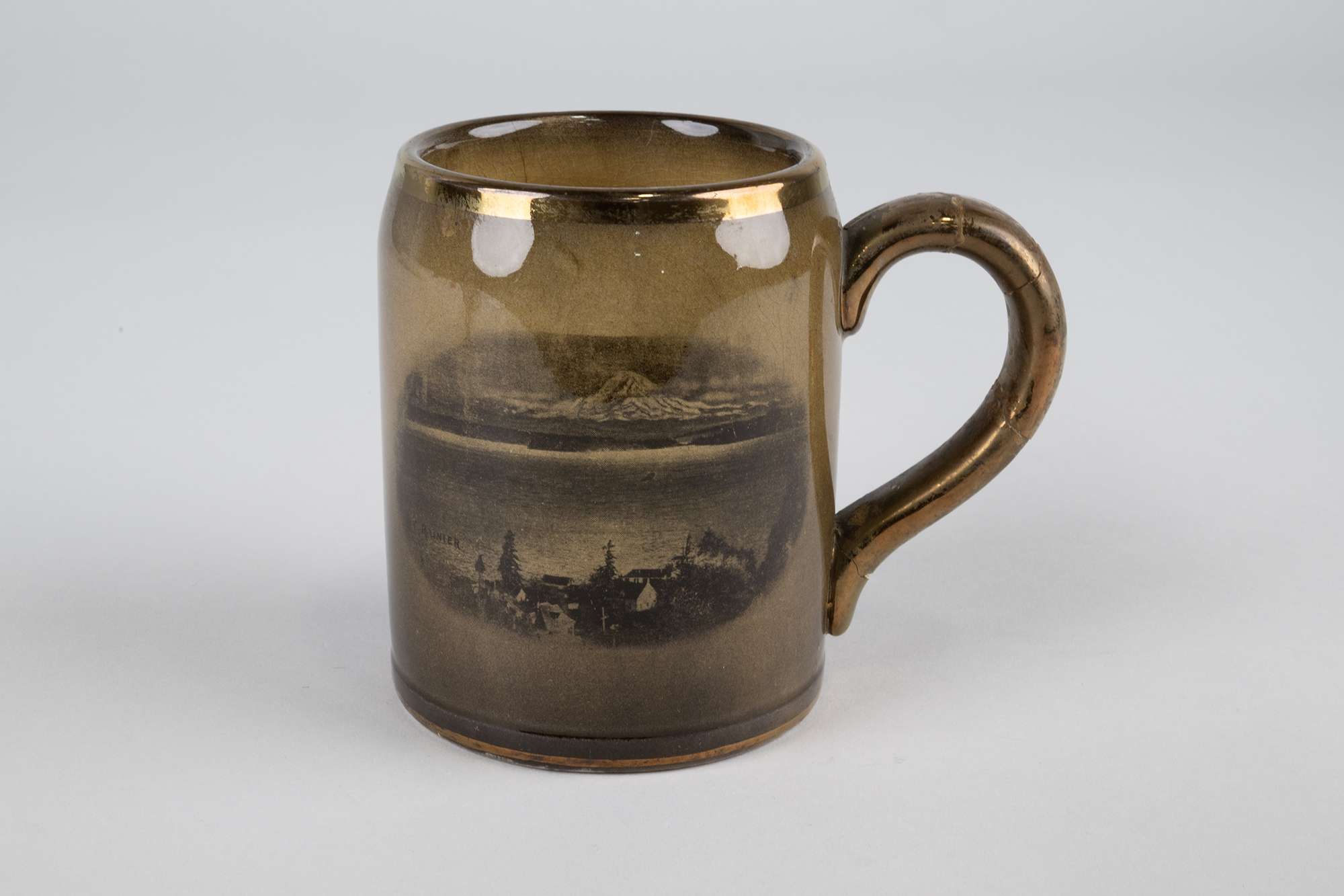 Image of Souvenir mug with picture of Mt. Rainier and 2nd Avenue, 1895